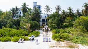 Zahrada ubytování Atoll Residence Dhangethi