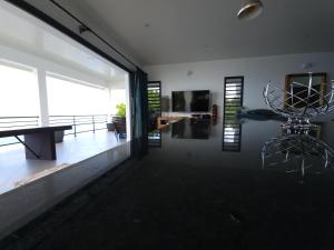 Posezení v ubytování Villa MATOANUI + 16 fotografií