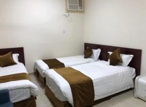 Кровать или кровати в номере sama alsadah