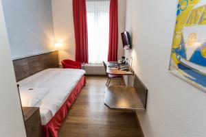 Voodi või voodid majutusasutuse Sorell Hotel Arabelle toas