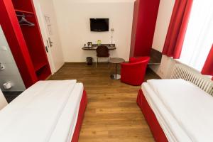 Voodi või voodid majutusasutuse Sorell Hotel Arabelle toas