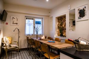 a dining room with a table and chairs at Holiday house 'De Moriaan' with airco in the heart of Antwerp in Antwerp