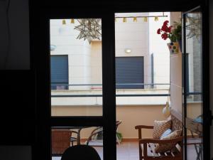 a view from a window of a balcony with chairs at Cozy holiday home in a charming area in Montilla