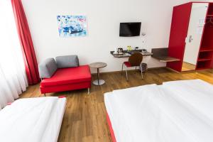 Voodi või voodid majutusasutuse Sorell Hotel Arabelle toas