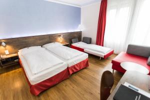 Voodi või voodid majutusasutuse Sorell Hotel Arabelle toas