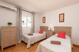 Łóżko lub łóżka w pokoju w obiekcie Villa Togio 2 by Villa Plus