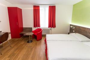 Voodi või voodid majutusasutuse Sorell Hotel Arabelle toas