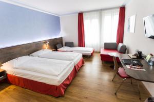Voodi või voodid majutusasutuse Sorell Hotel Arabelle toas