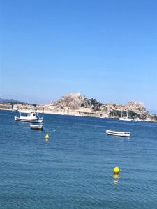 a group of boats in a large body of water at MeadowView Spacious renovated ground floor studio in Análipsis +22 photos