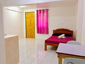 Postel nebo postele na pokoji v ubytování RB Baruiz "Hideaway" Inn - Cebu South