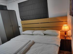 Postel nebo postele na pokoji v ubytování Villagewaves