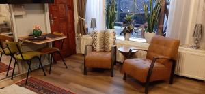 Posezení v ubytování B&B de Hartewens
