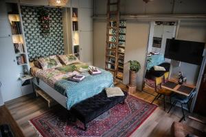 Postel nebo postele na pokoji v ubytování B&B de Hartewens