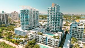 an aerial view of a city with tall buildings at Ocean 2 Sky at Monte Carlo Miami Beach in Miami Beach