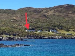 an island in the ocean with a red arrow at Borve House, Kilchoan in Kilchoan