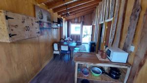 Kuchyň nebo kuchyňský kout v ubytování Cabañas & Habitaciones Del Alto