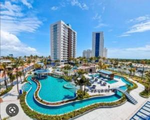 an aerial view of a pool at a resort at Salinas Premium Resort in Salinópolis