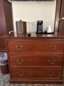 a dresser with a coffee pot on top of it at Best Western Plus Pioneer Square Hotel Downtown in Seattle