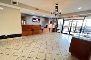a lobby of a fast food restaurant with a waiting room at Econo Lodge in Augusta