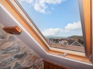 a skylight window in a house with a view at Carnorfa in Newport Pembrokeshire