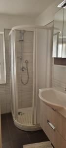 a bathroom with a shower and a sink at Sa Domo de Paolo in Alghero +15 photos