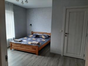 Postel nebo postele na pokoji v ubytování У Мирослави