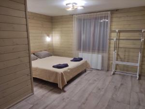 Postel nebo postele na pokoji v ubytování У Мирослави