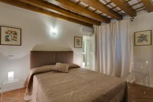 Posteľ alebo postele v izbe v ubytovaní Apartments Florence - Vigna Nuova Alberti