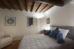 Posteľ alebo postele v izbe v ubytovaní Apartments Florence - Vigna Nuova Alberti