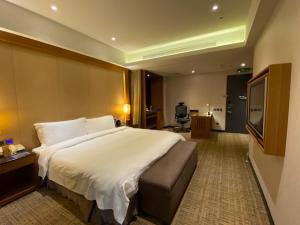 Katil atau katil-katil dalam bilik di The Tango Hotel Taipei XinYi