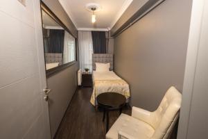 Postel nebo postele na pokoji v ubytování Cumbali Luxury Boutique Hotel