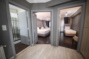 Postel nebo postele na pokoji v ubytování Cumbali Luxury Boutique Hotel