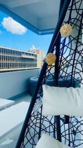 Rõdu või terrass majutusasutuses Urban Zen Appart Spacieux studio atypique avec bain a remous proche de tout