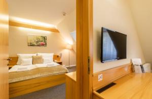Posteľ alebo postele v izbe v ubytovaní Aqua Hotel Termál