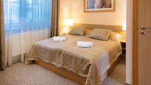 Posteľ alebo postele v izbe v ubytovaní Aquasol Resort