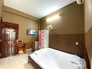Ένα ή περισσότερα κρεβάτια σε δωμάτιο στο Thu Đô Motel