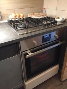 A kitchen or kitchenette at Relais Totì BeB bed e breakfast