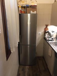 A kitchen or kitchenette at Relais Totì BeB bed e breakfast