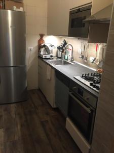 A kitchen or kitchenette at Relais Totì BeB bed e breakfast