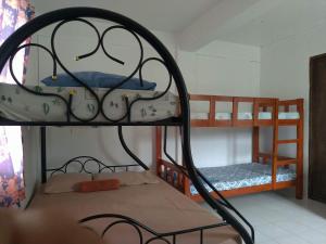 Postel nebo postele na pokoji v ubytování RB Baruiz "Hideaway" Inn - Cebu South