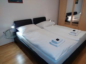 Postel nebo postele na pokoji v ubytování Appartement LARA SPA Čeladná + 10 fotografií