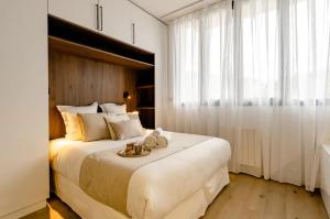 Posteľ alebo postele v izbe v ubytovaní Jacuzzi Bay avec LITERIE GRAND LUXE proche du lac Annecy Avenue du Parmelan