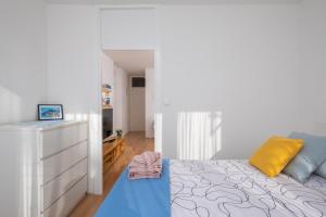 Posteľ alebo postele v izbe v ubytovaní City Gem