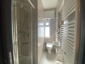 Ванная комната в Hotel Graziella