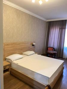 Letto o letti in una camera di Primer Hotel