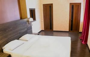 Letto o letti in una camera di Primer Hotel