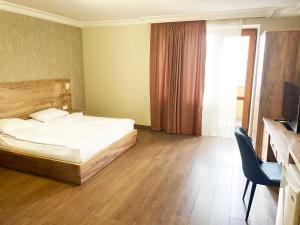 Letto o letti in una camera di Primer Hotel