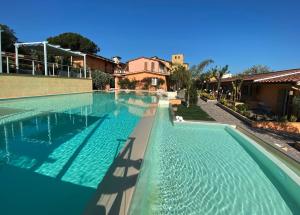 a large swimming pool with blue water at Orto Di Roma in Rome