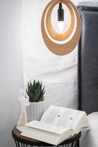 A bed or beds in a room at Sofilins Luxury Suite
