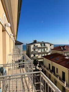 a view from the balcony of a building at Hotel Stella D'Italia in Rimini